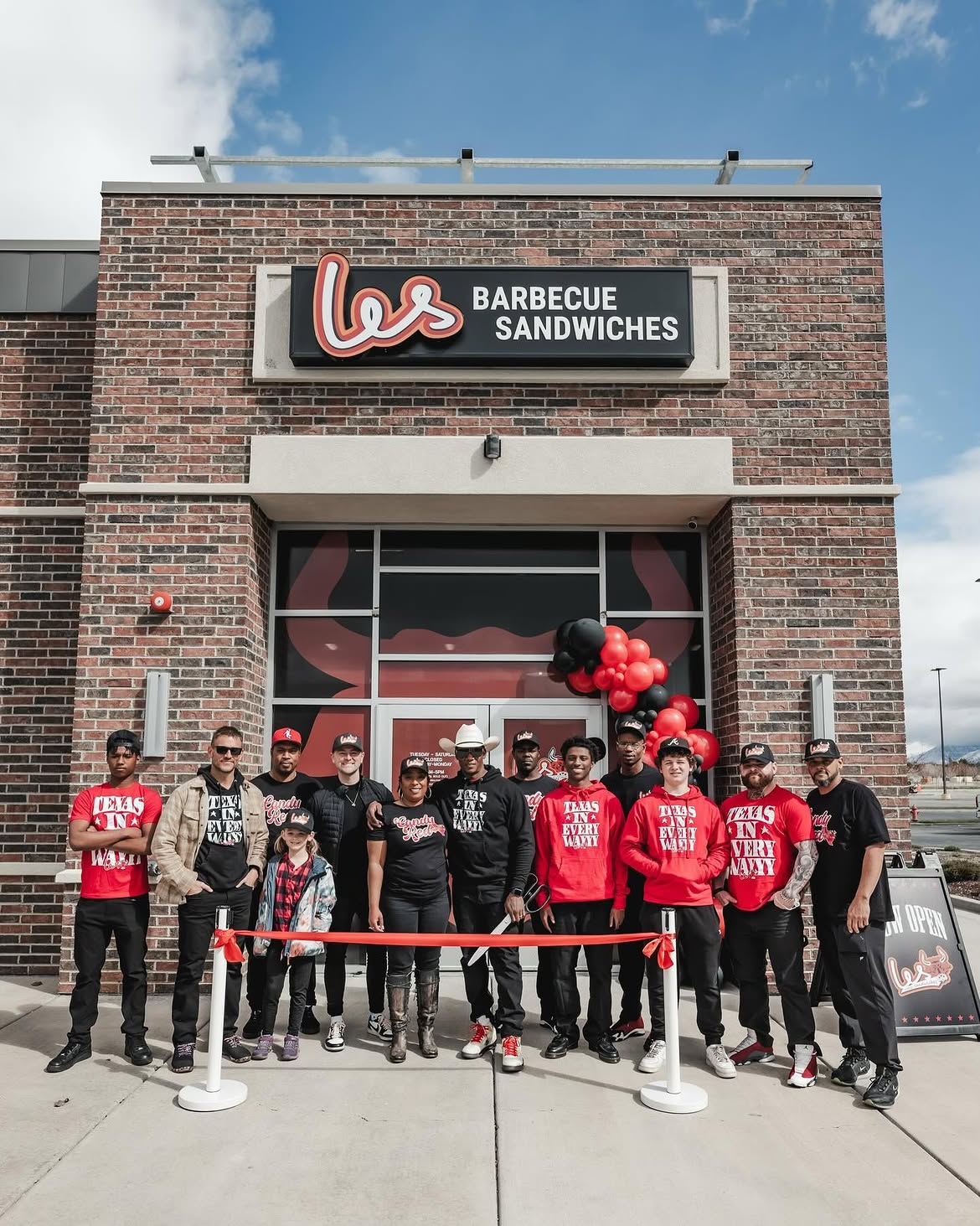 Ribbon cutting at the Les Barbecue Sandwiches restaurant opening